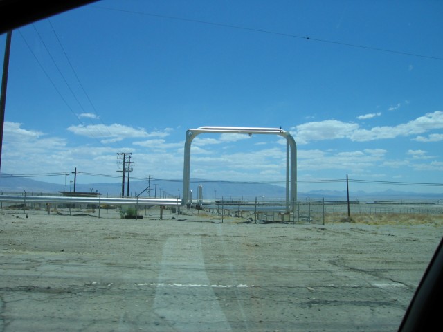 There were these strange pipes running along the side of the road for several miles.  They connected one processing plant with another.  The air smelled sulfuric.